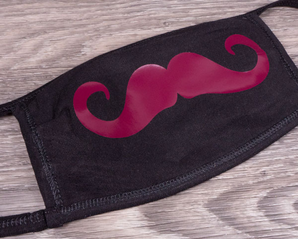 A black face mask with a mustache design on it made with Maroon ThermoFlex Light