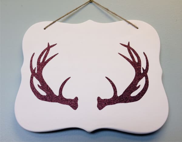 Antlers placed onto a sign made in Brown Pressure Sensitive GlitterFlex Ultra