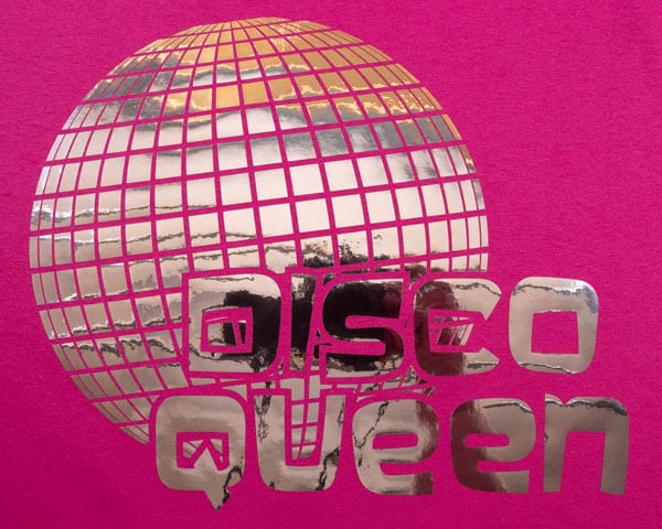 A design of a disco ball with the words "Disco Queen" made with Brilliant Silver DecoFilm