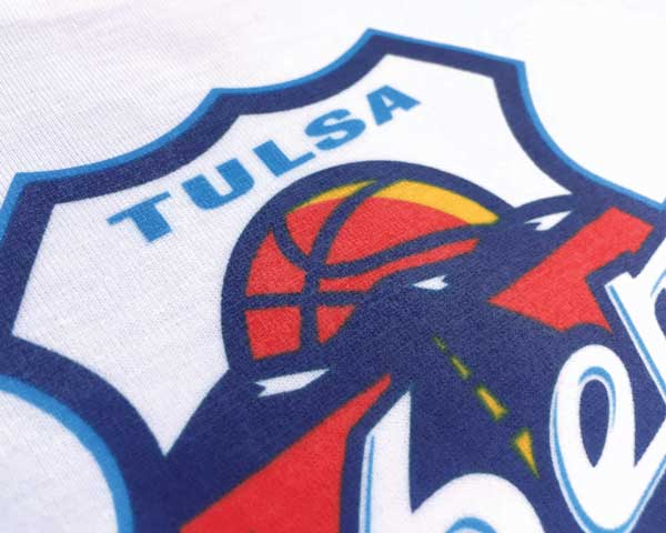 A close up of an image printed with ColorJet Media- it says Tulsa and shows a basketball