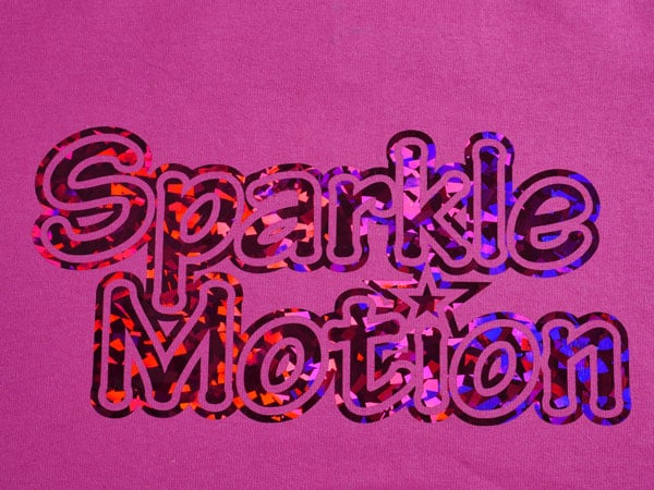 A shirt that reads "Sparkle Motion" made using Crystal Fuchsia DecoSparkle