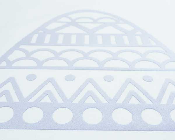 A close up of an easter egg design cut using Lavender Premium DecoFlock