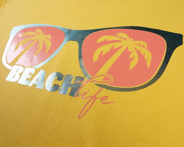 A beach sunglasses design that says "Beach life" in Sky Blue and Coral Embossed DecoFilm