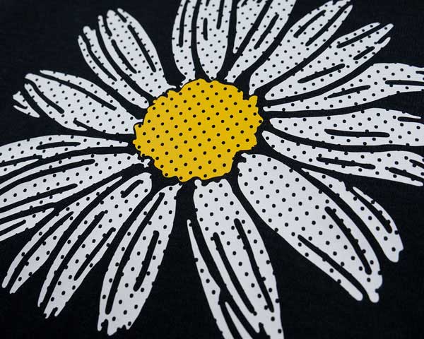 A flower made from White and Yellow Perf FashionFlex