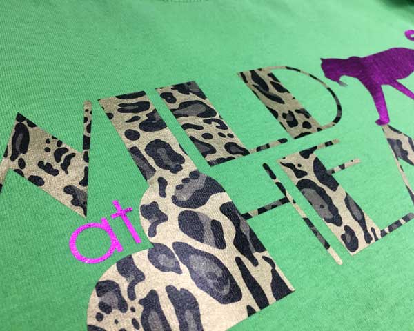 A shirt that reads "Wild at Heart" made with Cheetah and Cherry DecoFilm Soft Metallics