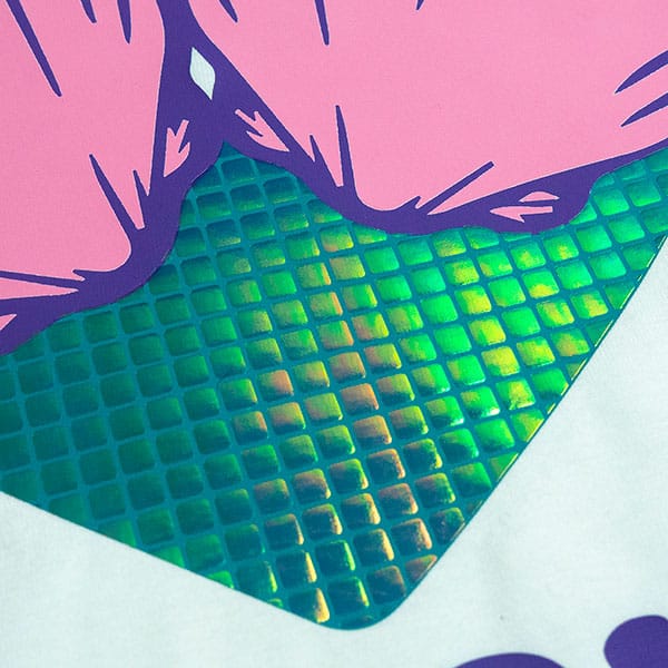 A close up of a shirt with a mermaid theme made with Rainbow Square DesignFilm and ThermoFlex Plus