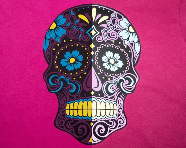 A picture showing a sugar skull half before flash and one after flash made using ThermoFlex Plus and Reflection Decoration