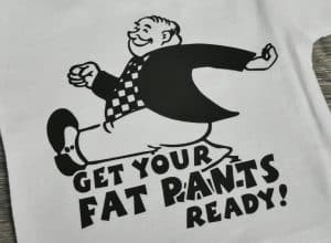 Image depicting the downloadable cut file that says "Get Your Fat Pants Ready" with a larger, happy man walking
