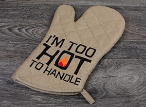Image depicting the downloadable cut file that reads "I'm Too Hot to Handle" with a flame in the o of hot