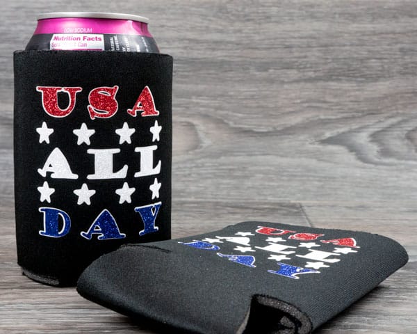A drink koozie that reads "USA All Day" made with GlitterFlex Ultra on top of ThermoFlex Turbo