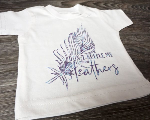 A feather design using Dark Grey/Mint Bandana ThermoFlex Fashion Patterns