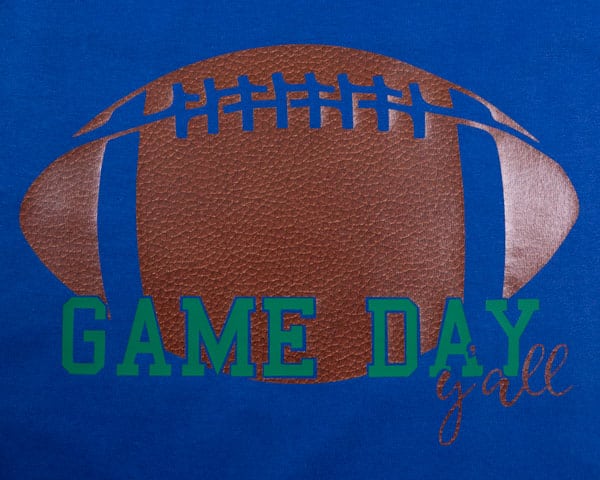 A shirt that reads "Game Day Y'all" with a football in ThermoFlex Plus and Brown Leather ThermoFlex Fashion Patterns