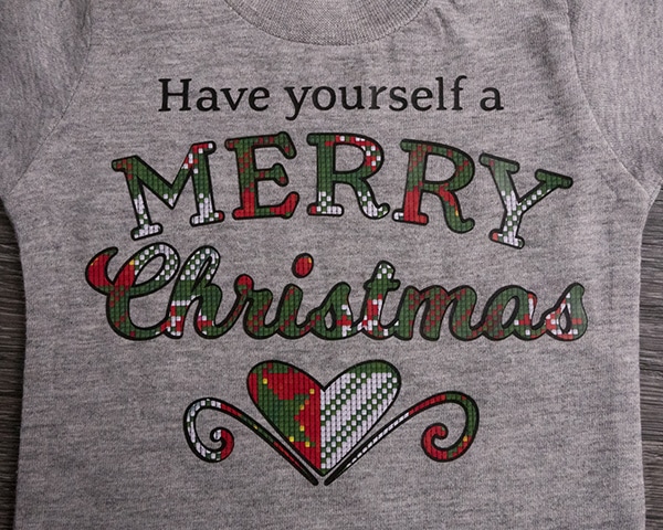 A shirt that reads "Have Yourself a Merry Christmas" in ThermoFlex Plus and Ugly Christmas Sweater ThermoFlex Fashion Patterns Festive