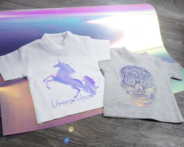 Two mini tees, one with a unicorn and one with a sugar skull, made in Blue DecoFilm Brilliant Chameleon