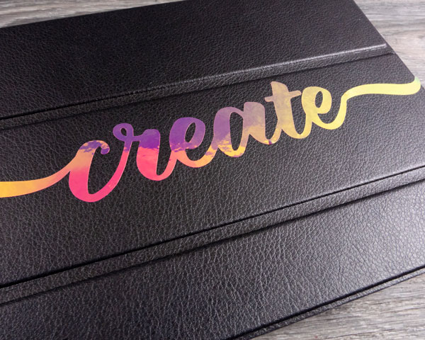 A tablet case that reads "Create" made with Pink Chameleon