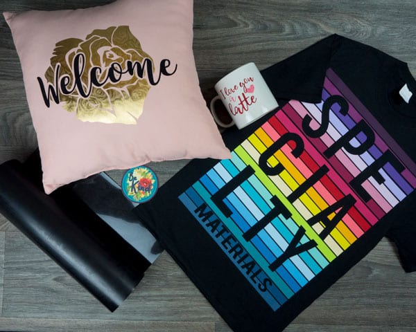An image with a wide variety of objects- a ThermoFlex® Plus roll, DecoFilm® Soft Metallics pillow, Pressure Sensitive GlitterFlex® Ultra mug, and ThermoFlex® Plus shirt