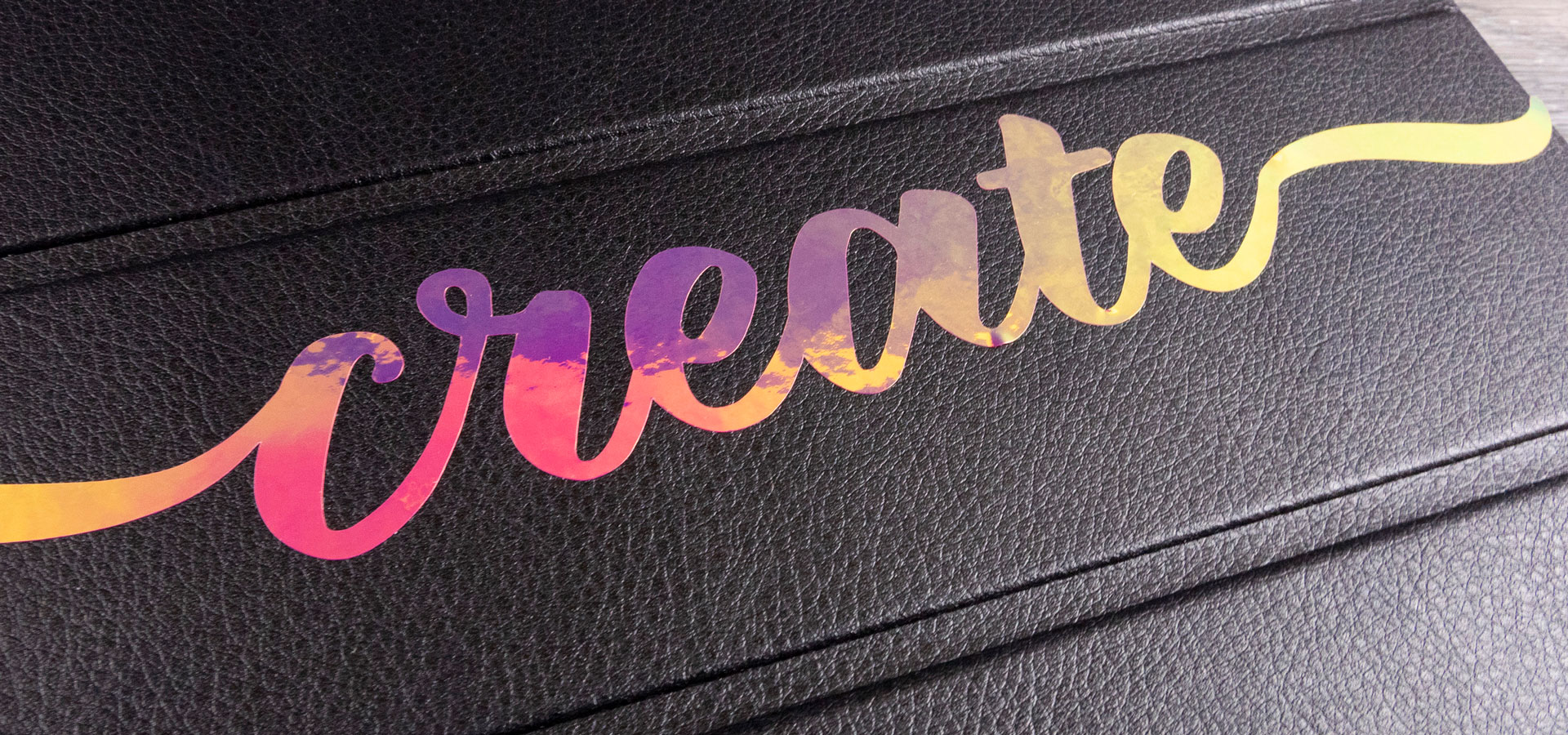 A tablet case that reads "Create" made with Pink Chameleon