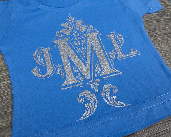 A monogram with the initials JLM made with Silver GlitterFlex Light