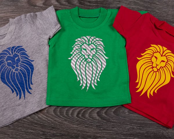 A lion design made three ways with Textured Carbon Fiber Royal Blue, Silver, and Medium Yellow
