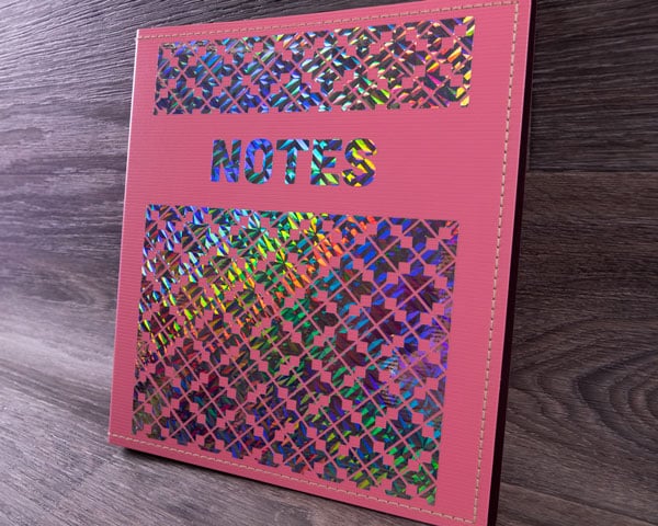 A notebook that reads "Notes" with a pattern in Confetti Blocks