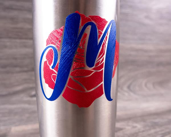 A mug with a monogramed rose in Brush Stroke Textured in Red & Blue
