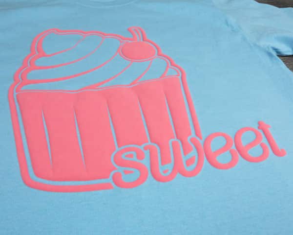 A cupcake with the word "Sweet" made with Dark Pink FashionFlex® Puff