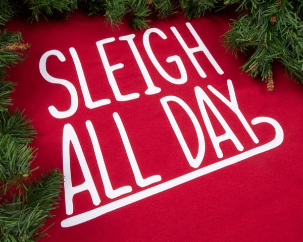 A shirt with the phrase "Sleigh All Day" in White ThermoFlex Plus