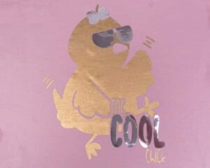 A shirt with a chick in sunglasses and a bow that reads "one cool chick" in Super Gold and Brilliant Silver DecoFilm