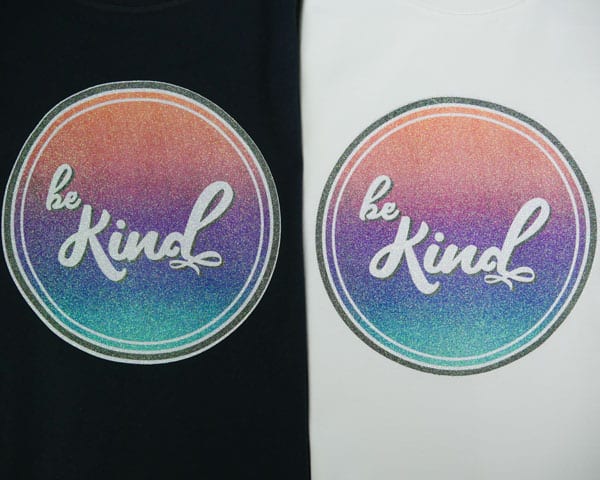 The two sublimated "Be Kind" shirts compared