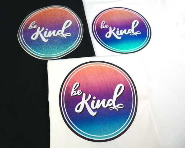 The "Be Kind" file shown sublimated three ways- on GlitterFlex Ultra, SubliFlex, and DecoFilm Brilliant Chameleon