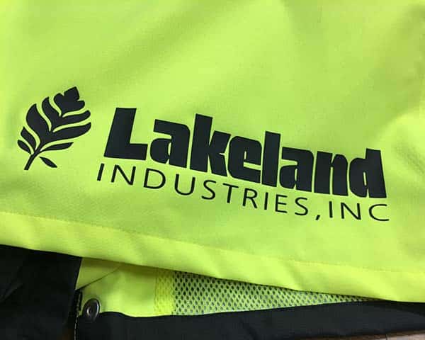 A nylon jacket with the text "lakeland Industries, Inc" in Black ThermoFlex Xtra