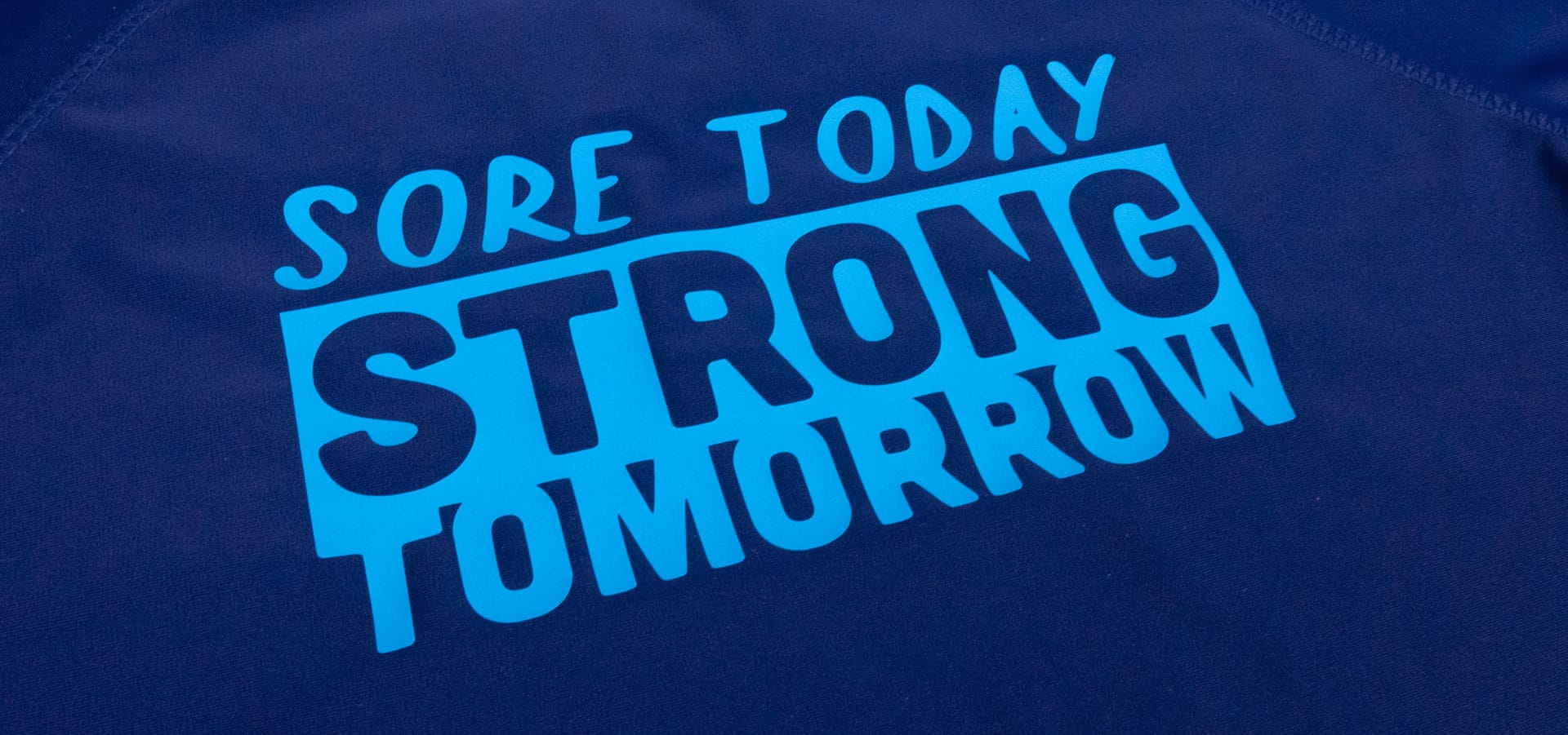 A sports shirt reading "Sore Today Strong Tomorrow" in Columbia Blue ThermoFlex Xtra