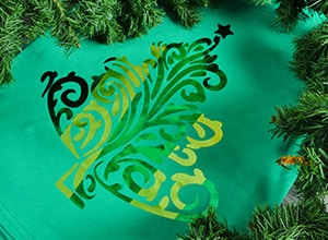 Image depicting the downloadable cut file that has a Christmas tree made of swirls