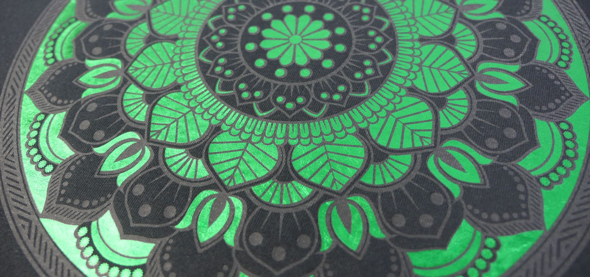 A mandala made with Frosty Clear and Green DecoFilm Soft Metallics layered on top. This close up shows the detail on the design.