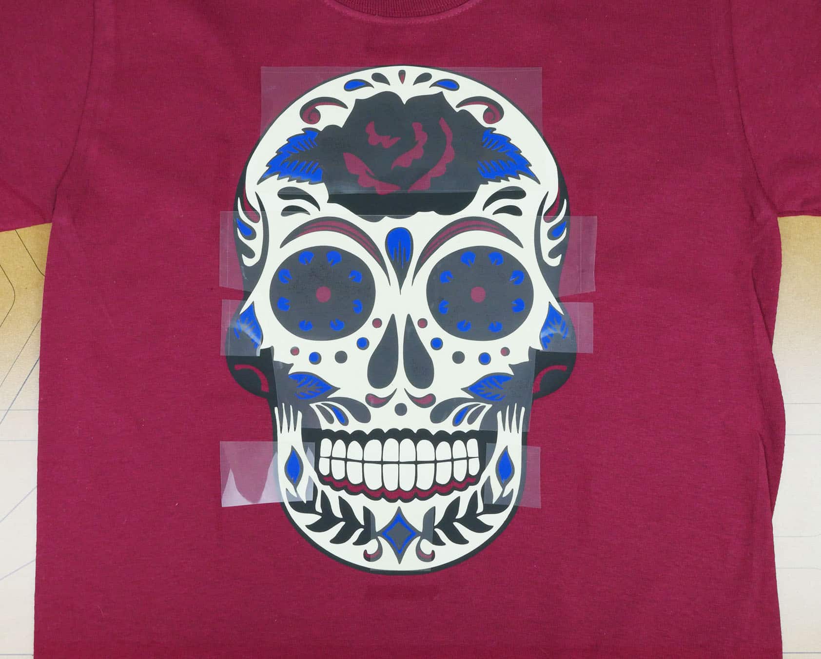 Showing layering the Royal Blue ThermoFlex Plus layer on the sugar skull