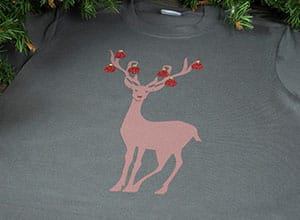Image depicting the downloadable cut file that has a reindeer with ornaments on his antlers