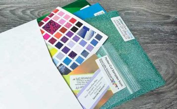 A picture showing what a sample pack looks like- it comes with a brochure, cut samples, and three sample sheets